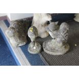 A QUANTITY OF STONE GARDEN ANIMALS TO INCLUDE AN OTTER