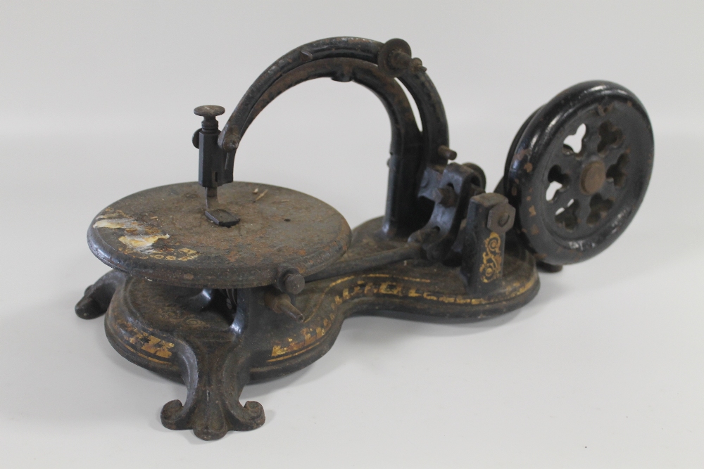 A 19TH CENTURY 'FLORENCE' TYPE SEWING MACHINE, gilt and black painted surfaces