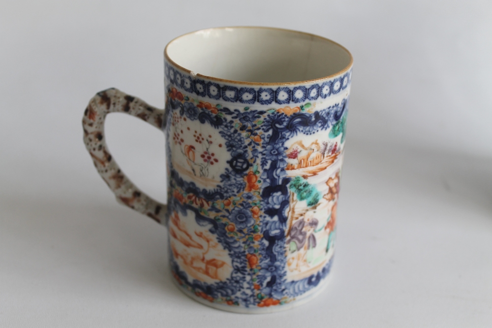 TWO CHINESE EXPORT WARE PORCELAIN TANKARDS, with Polychrome panels on a blue ground. (The larger H. - Image 4 of 9