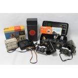 A QUANTITY OF ASSORTED CAMERAS, to include an Olympus OM-20, a Zenit - B, a boxed Brownie 44A camer