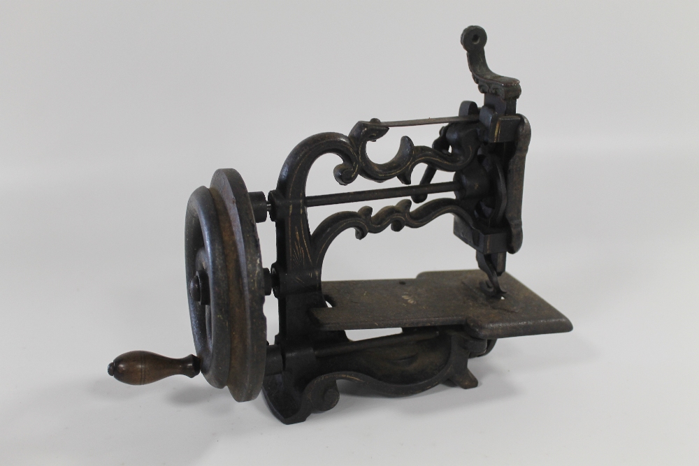 A 19TH CENTURY 'WEIR' TYPE SEWING MACHINE, gilt and black painted surfaces - Image 4 of 4