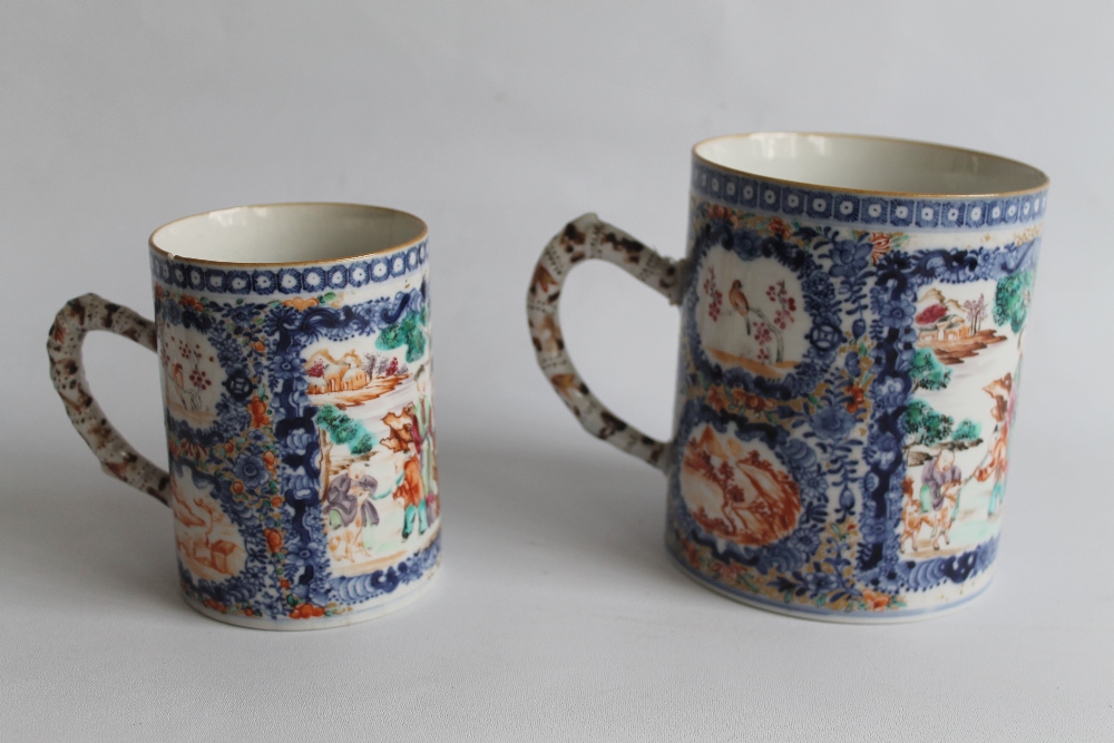 TWO CHINESE EXPORT WARE PORCELAIN TANKARDS, with Polychrome panels on a blue ground. (The larger H.