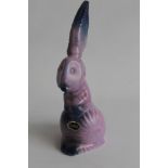 AN UNUSUAL CARLTON WARE PURPLE RIBBED RABBIT. H. 18.5 cm