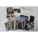 A COLLECTION OF X-FILES RELATED POSTCARDS AND COLLECTORS CARDS, to include full sets