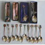 A COLLECTION OF SILVER & WHITE METAL COMMEMORATIVE TEA SPOONS, some with enamel decoration