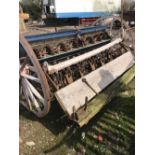 A VINTAGE AGRICULTURAL SEED DRILL