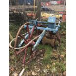 A VINTAGE AGRICULTURAL SEED DRILL