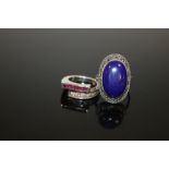 A STERLING SILVER LAPIZ LAZULI DRESS RING TOGETHER WITH ANOTHER (2)