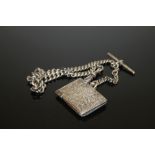 AN ANTIQUE HALLMARKED SILVER VESTA CASE ON T BAR CHAIN