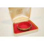 A VICTORIAN SILVER GILT BANGLE IN ORIGINAL BOX