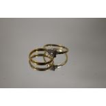 A HALLMARKED 22CT GOLD WEDDING BAND TOGETHER WITH AN 18CT GOLD RING