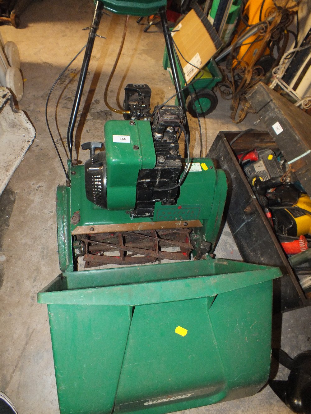 A PETROL SUFFOLK PUNCH 35S LAWNMOWER WITH BOX