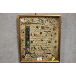 A FRAMED AND GLAZED GOLD LEAF MANUSCRIPTS