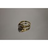 A HALLMARKED 18CT GOLD DIAMOND RING