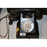 A VINTAGE BAKELITE TELEPHONE WITH MODERN CONNECTION