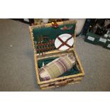 A WICKER PICNIC HAMPER