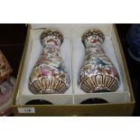 A BOXED PAIR OF ORIENTAL CLOISONNE VASES AND STANDS