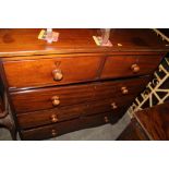A MAHOGANY TWO OVER THREE CHEST OF DRAWERS