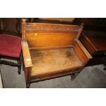 AN OAK BENCH WITH BEADED DECORATION AND SINGLE DRAWER