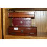 A LOCKABLE MAHOGANY WRITING SLOPE, TOGETHER WITH TO OTHER BOXES