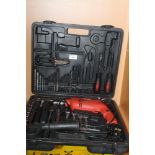 A CASED TOOL SET TO INCLUDE A DRILL, HAMMER, ETC