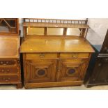 A MAHOGANY MIRROR BACK SIDEBOARD