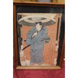 AN ANTIQUE JAPANESE COLOURED WOOD BLOCK PRINT OF A SAMURAI