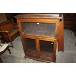 A GLOBE WERNICKE STYLE GLAZED STORAGE CABINET