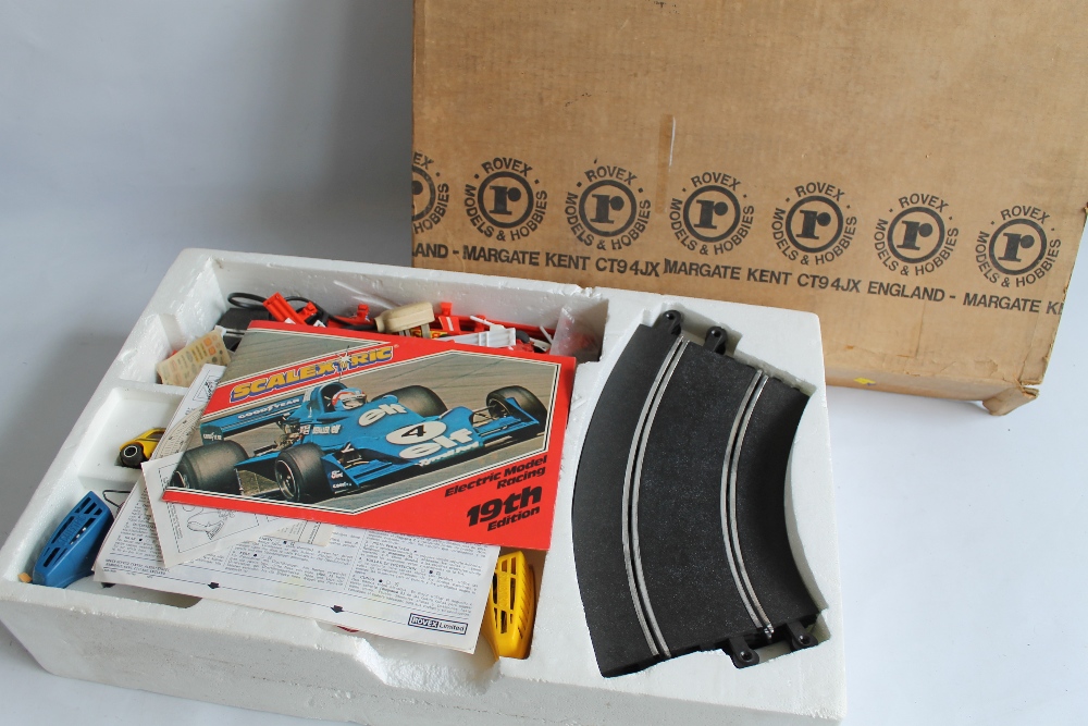 A SCALEXTRIC 300 MINI 1275 GT SET in original Rovex outer packaging