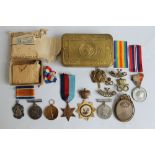 A WWI WAR MEDAL AND VICTORY MEDAL (3116 Cpl. H. B. Butler S. Staffs Yeo.) in Christmas 1914 tin with