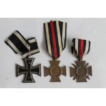 A WWI IRON CROSS 2ND CLASS and two WWI Honor Crosses (one with swords, the other without) (3)