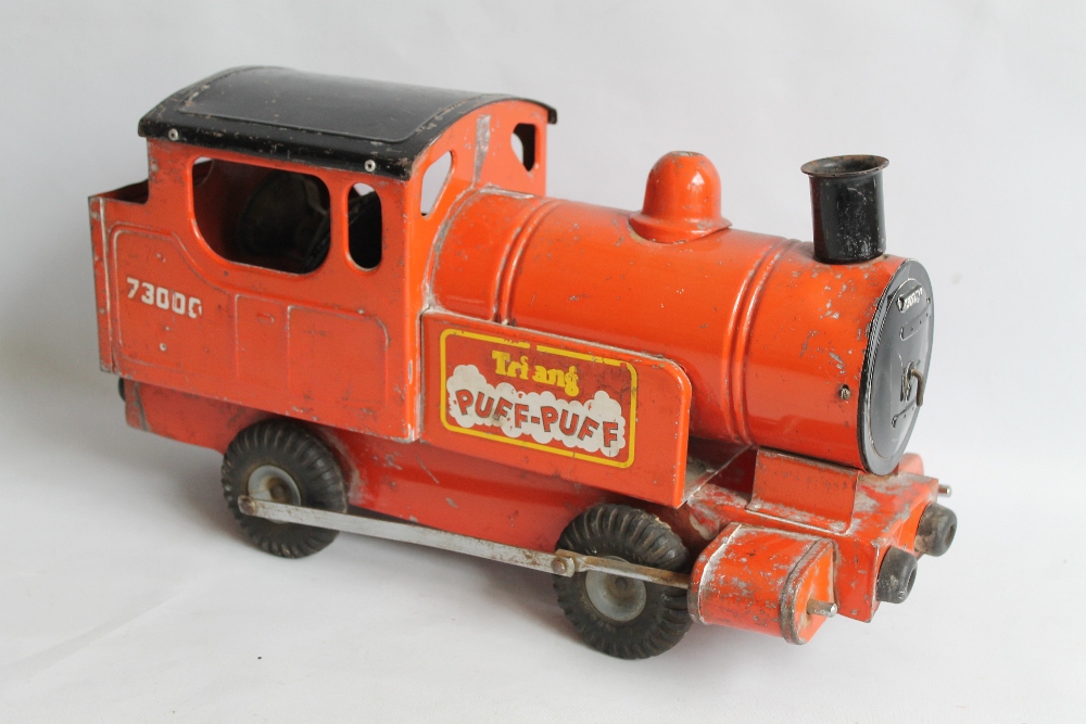 A TINPLATE TRIANG PUFF-PUFF in red and black livery