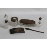 A SMALL COLLECTION OF SILVER ITEMS to include calling card case, silver topped scent bottles etc.