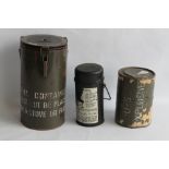 A BRITISH MILITARY THERMOS DATED 1942, together with a large vacuum flask dated 1952 and a 'U.S.