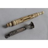 A HALLMARKED SILVER CIGAR PIERCER with fob ring and a bone dip pen in decorated pierced travelling