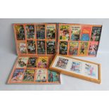 THREE FRAMED SETS OF REPRODUCTION PULP PAPERBACK COVERS together with another, frame size 42 x 52 cm