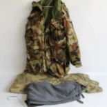 A 'PORTWEST' CAMOUFLAGE JACKET, size medium along with a camouflage poncho and a pair of riding