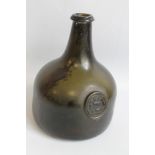 A SEALED BLACK GLASS MALLET WINE BOTTLE, carrying the seal of Sandford Hall, Shropshire, with a good