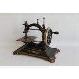 A 19TH CENTURY SEWING MACHINE, possibly by 'National Sewing Machine Co.', black painted bodywork