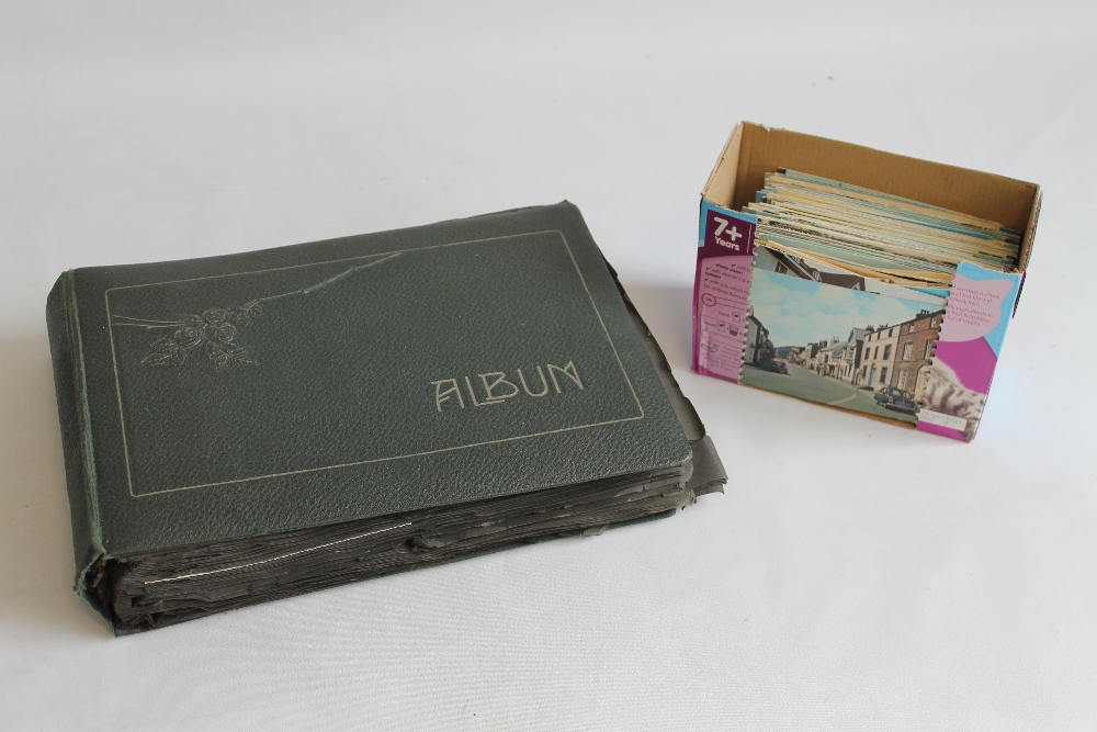 AN ALBUM OF EDWARDIAN AND LATER POSTCARDS, GREETINGS CARDS ETC. together with a quantity of loose