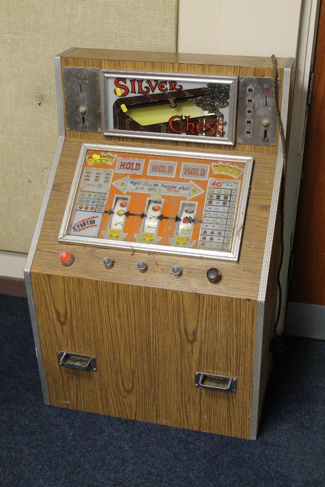 A VINTAGE 1970S SILVER CHEST BRENCO FRUIT MACHINE A/F