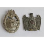 A GERMAN THIRD REICH 'NSKOV' BADGE and one other (2)