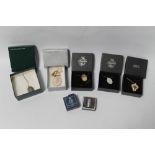 FIVE BOXED VARIOUS FRANKLIN MINT PENDANTS, to include Mother's Day carnation, the Christmas Rose,