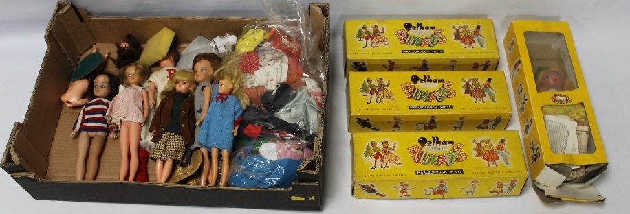 FOUR BOXED PELHAM PUPPETS, together with a small collection of Sindy, Tressy and other dolls to