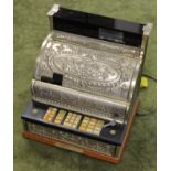 A 100TH ANNIVERSARY EDITION NATIONAL CASH REGISTER, with brass effect