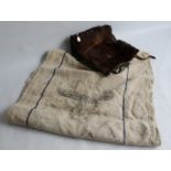 A WWII GERMAN, HANS DEUTER FUR COVERED POUCH, dated 1942 and a Third Reich grain / flour sack with