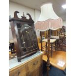 A MODERN HANGING CORNER CABINET AND A STANDARD LAMP (2)