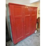 AN ANTIQUE LARGE PAINTED THREE DOOR CUPBOARD H 192 L 186 CM