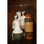 TWO WEST GERMAN VASES TOGETHER WITH A STAFFORDSHIRE STYLE FLATBACK 'ROBIN HOOD' FIGURE