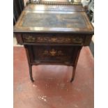 A LATE VICTORIAN METAMORPHIC INLAID ROSEWOOD DAVENPORT WITH ORIGINAL LEATHER TOP HAVING DROP DOWN